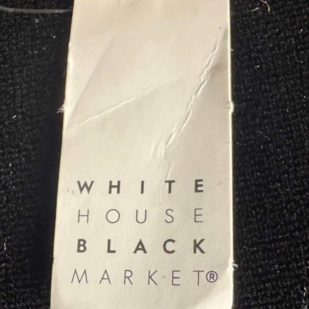 White House Black Market Floral Studded Wristlet